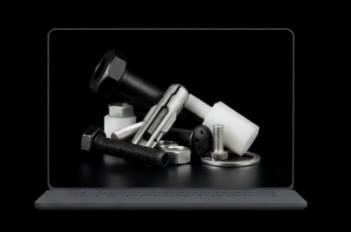 Laptop showcasing screws, bolts, nuts and fasteners
